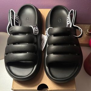 Black Ugg slides